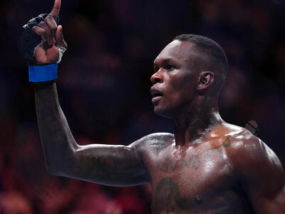 Israel Adesanya reacts after knocking out Alex Pereira in the UFC middleweight championship fight during the UFC 287 event at Kaseya Center on April 08, 2023 in Miami, Florida. (Photo by Cooper Neill/Zuffa LLC)