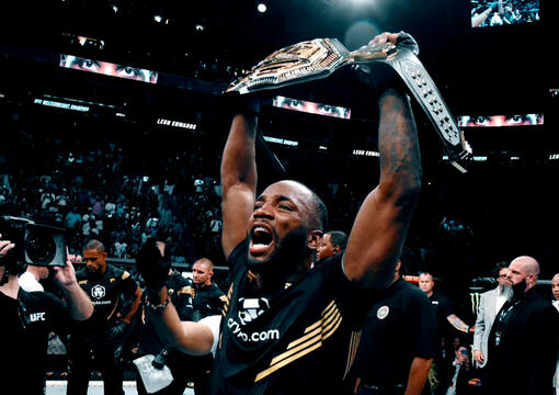 Leon Edwards celebrates after his victory over Kamaru Usman