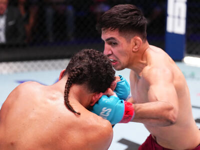 Jose Delgado punches Ernie Juarez in a featherweight fight during Dana White's Contender Series season eight, week one on August 13, 2024 in Las Vegas, Nevada. (Photo by Chris Unger/Zuffa LLC)