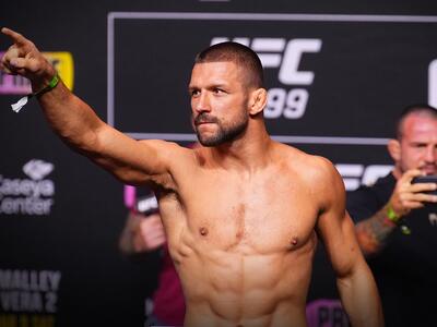 Mateusz Gamrot of Poland poses on the scale during the UFC 299 ceremonial weigh-in at Kaseya Center on March 08, 2024 in Miami, Florida. (Photo by Chris Unger/Zuffa LLC via Getty Images)